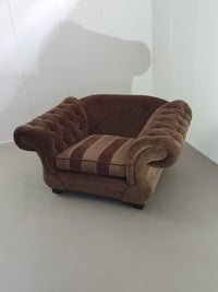 Large weighty love seat with the original matching cushions.
Marked "Handmade in Holland"