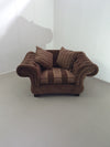 Large weighty love seat with the original matching cushions.
Marked "Handmade in Holland"