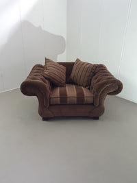 Large weighty love seat with the original matching cushions.
Marked "Handmade in Holland"