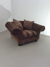 Large weighty love seat with the original matching cushions.
Marked "Handmade in Holland"