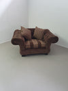 Large weighty love seat with the original matching cushions.
Marked "Handmade in Holland"