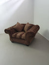 Large weighty love seat with the original matching cushions.
Marked "Handmade in Holland"