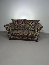 Weighty 80's zebra print sofa. Very good condition.