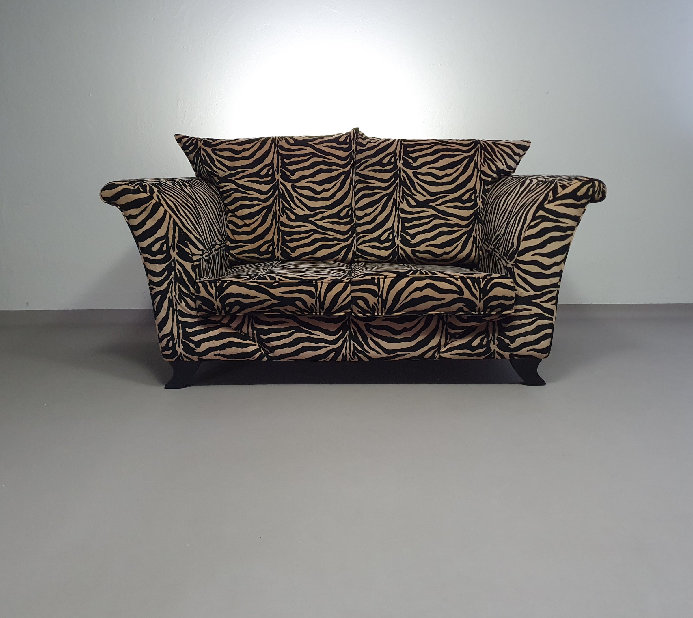 Weighty 80's zebra print sofa. Very good condition.