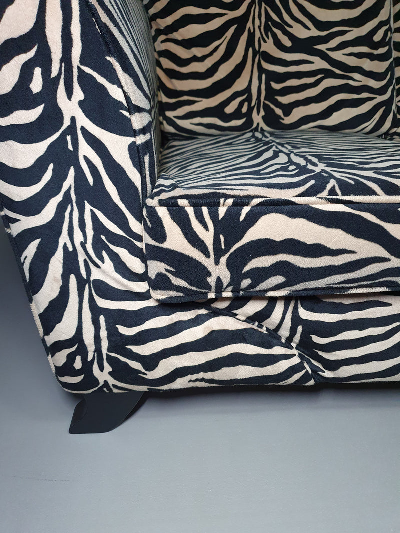 Weighty 80's zebra print sofa. Very good condition.