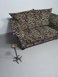 Weighty 80's zebra print sofa. Very good condition.