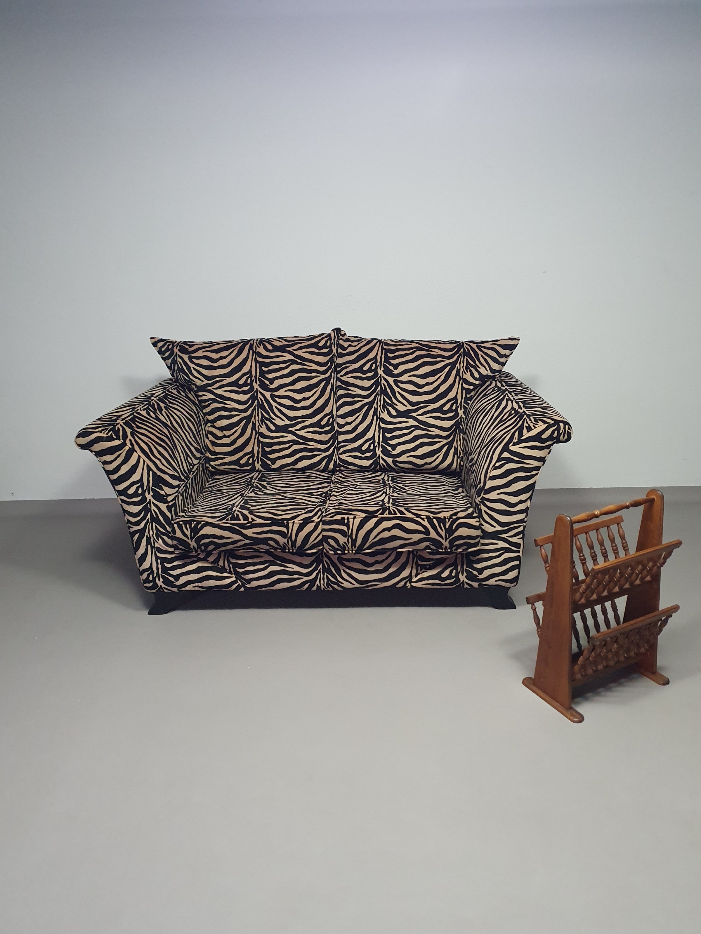 Weighty 80's zebra print sofa. Very good condition.