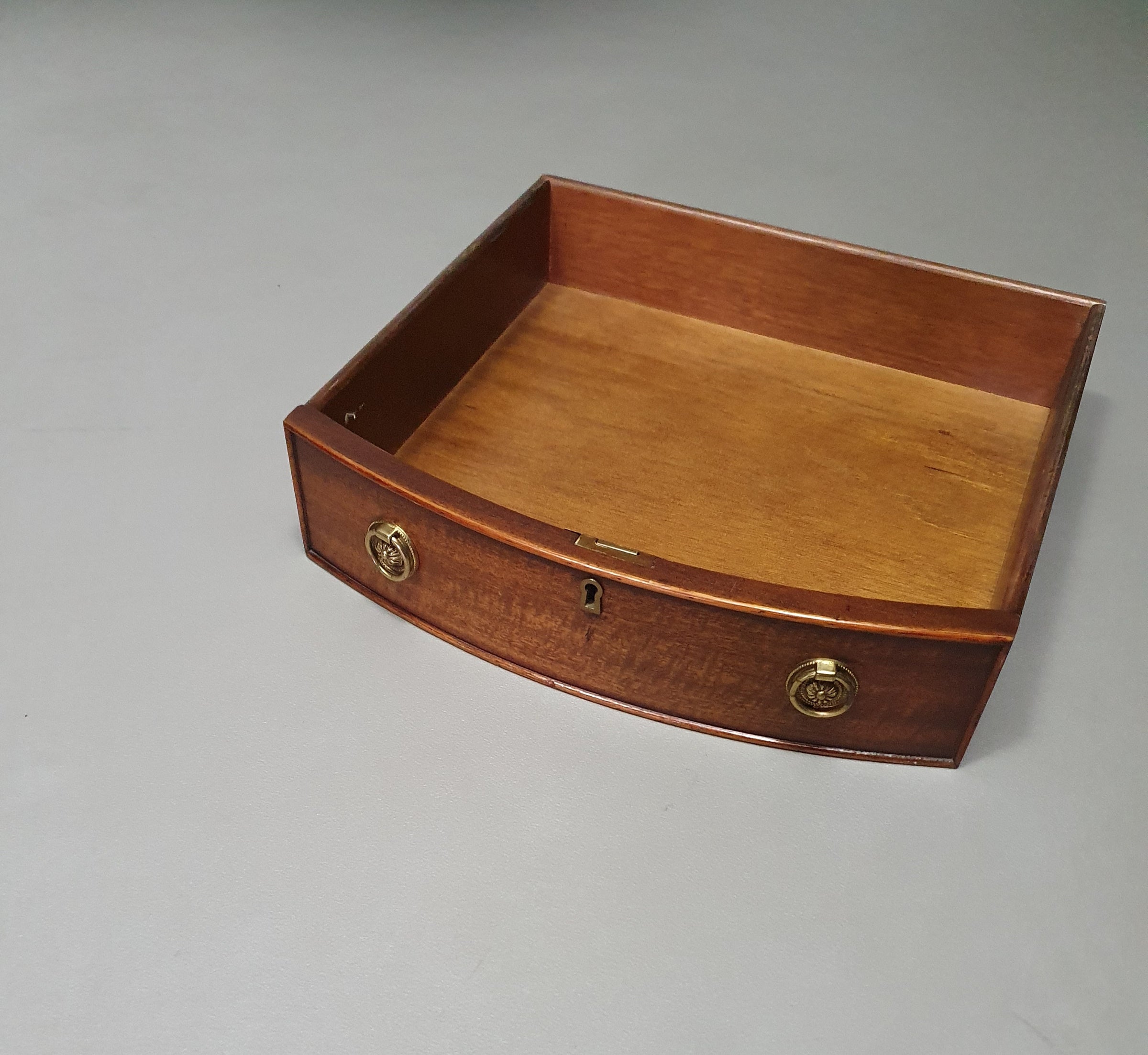 Mahogany Victorian " Heldense " Coffee table / Drum table with leather top on brass wheels. '80s