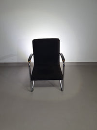 Tubular frame arm chair. With corduroy fabric. Fana Metaal Rotterdam