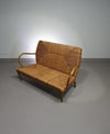 Vintage French papercord sofa with a metal frame base