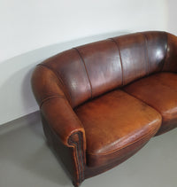 Beautiful subtly designed sheep leather sofa from the Joris brand