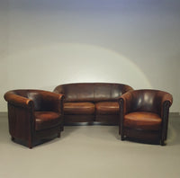 Beautiful subtly designed sheep leather club chair / sofa from the Joris brand.