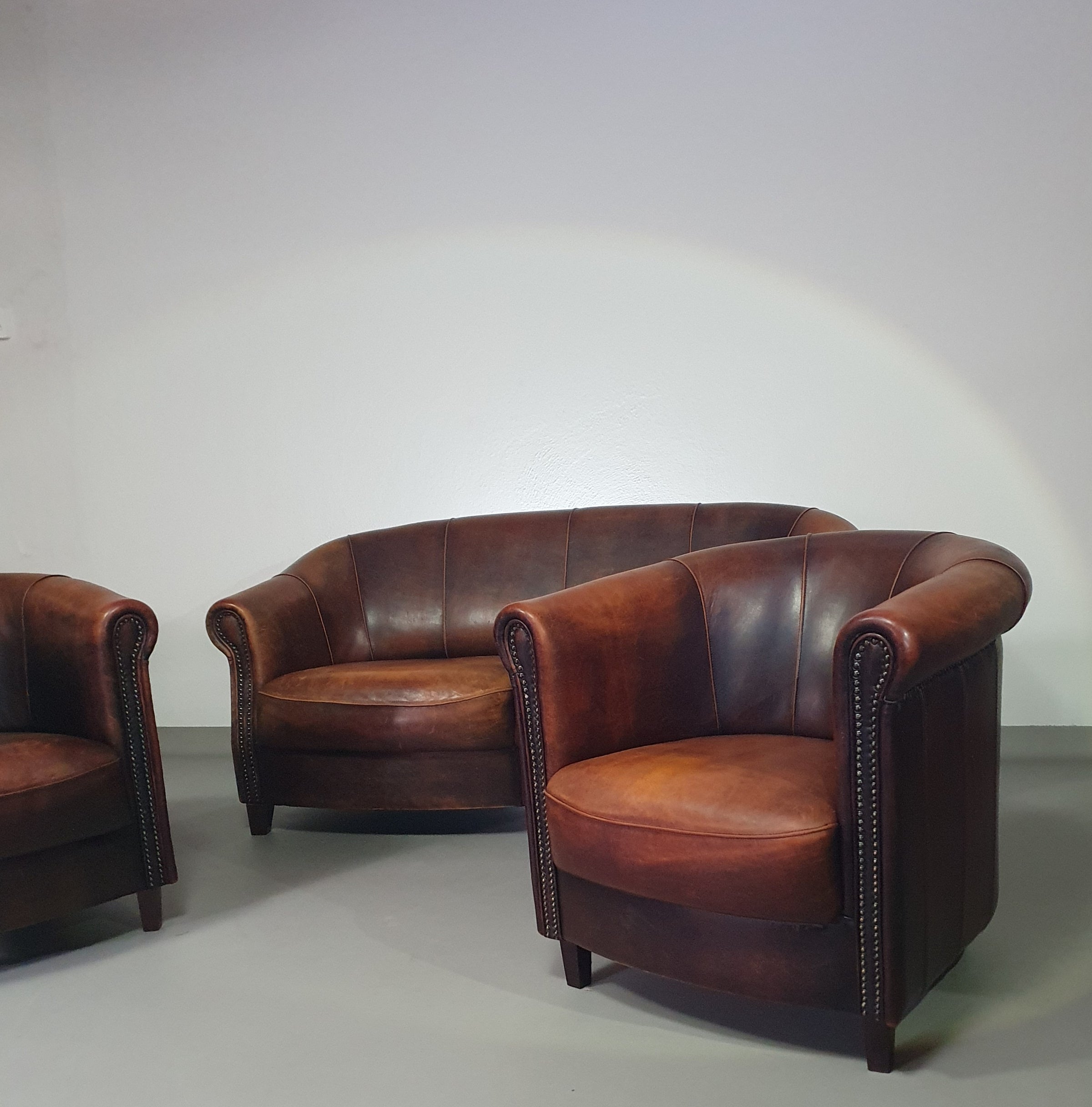 Beautiful subtly designed sheep leather club chair / sofa from the Joris brand.