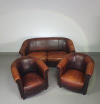 Beautiful subtly designed sheep leather club chair / sofa from the Joris brand.