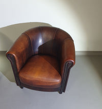 Beautiful subtly designed sheep leather club chair / sofa from the Joris brand.