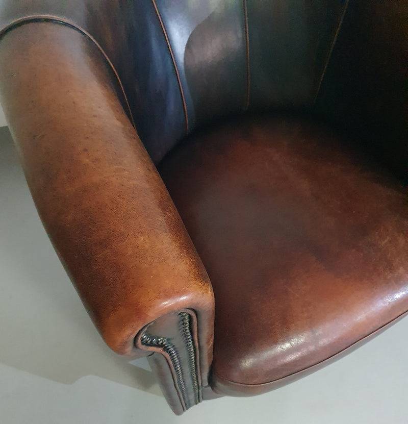 Beautiful subtly designed sheep leather club chair / sofa from the Joris brand.