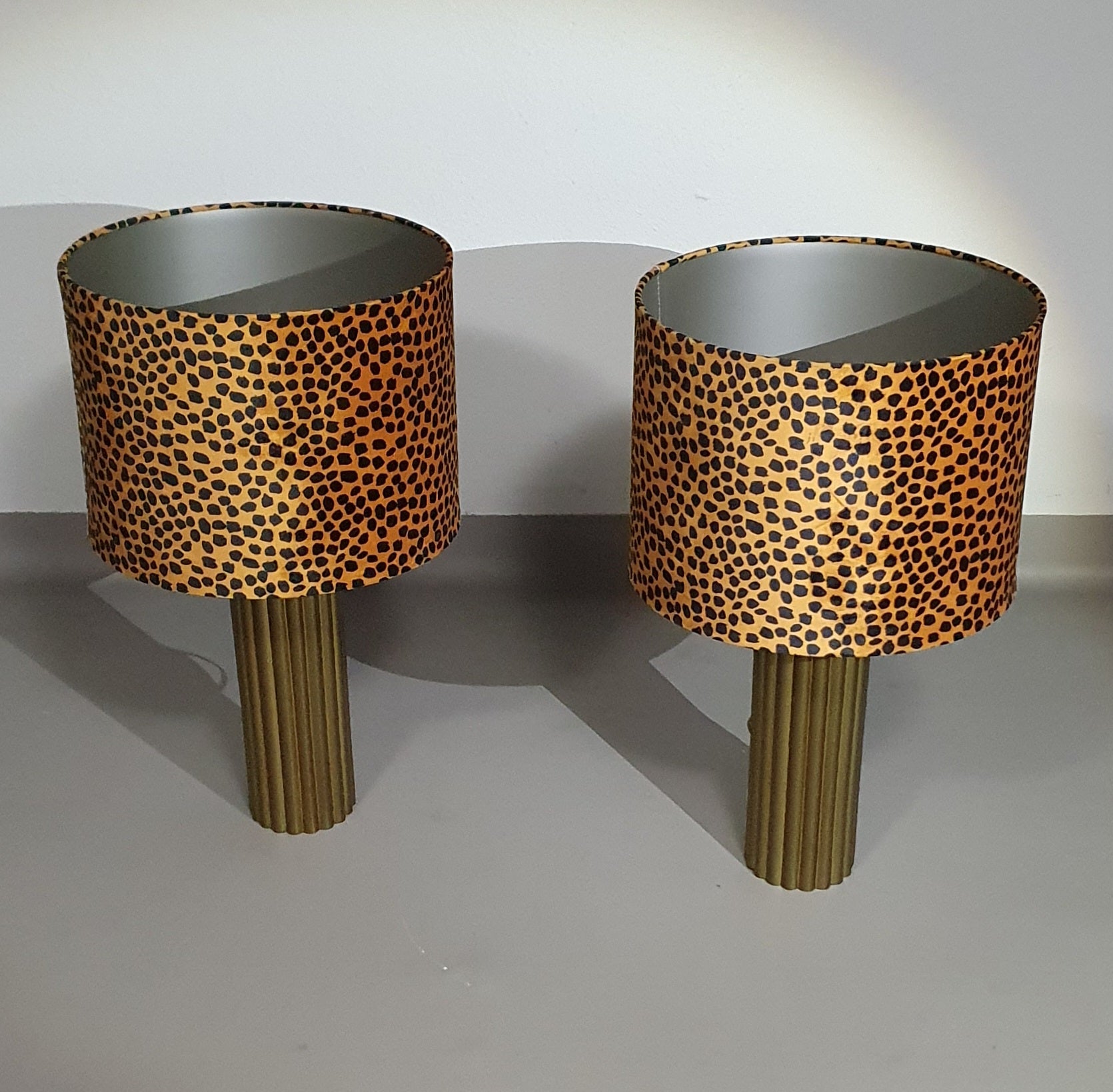 Pair of Kullmann brass table lamps