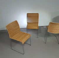 Stacking wicker, rattan chairs (4) model S.21 on a chromed steel structure. Designed by Tito Agnoli