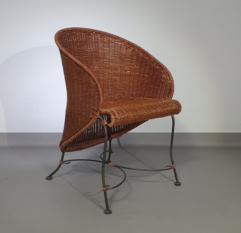 Small side table / chair with elegantly curved wrought iron legs enhanced by a woven rattan seat and top