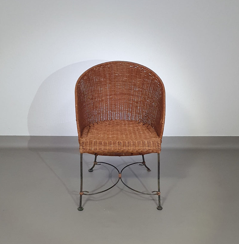 Small side table / chair with elegantly curved wrought iron legs enhanced by a woven rattan seat and top