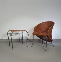 Small side table / chair with elegantly curved wrought iron legs enhanced by a woven rattan seat and top