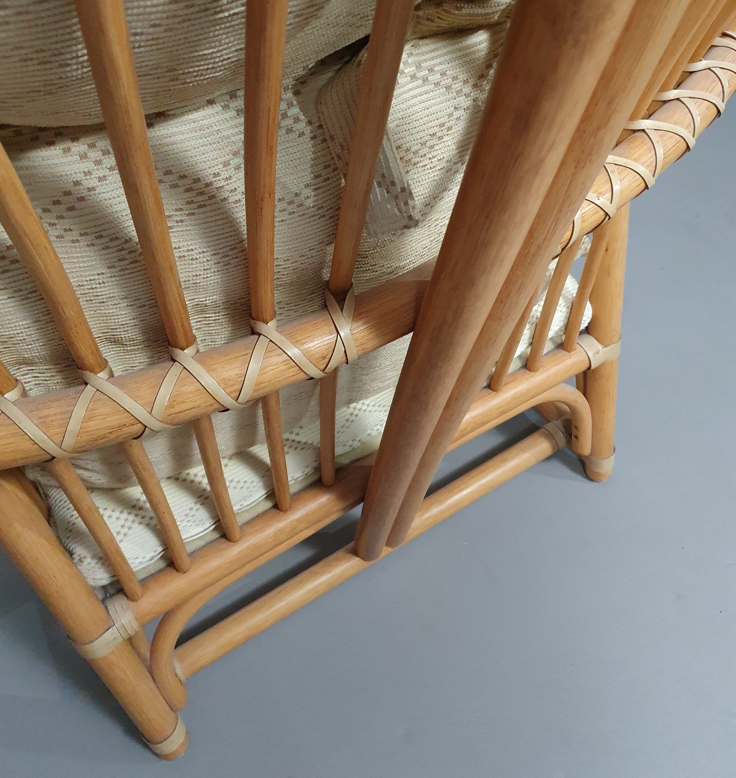 Oversized rattan / bamboo lounge chair with original cushions. 1970s