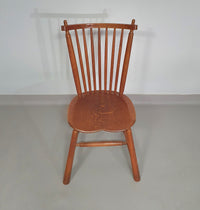 De Ster Geldermalsen Spindle Back dining chair 6 x in solid Oak. With a small carved decoration in the back rest.
1960s