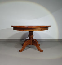 70s Pine wood dining table / wood column leg table in 4-leg design with round top 
Width 125 cm
Height 75 cm