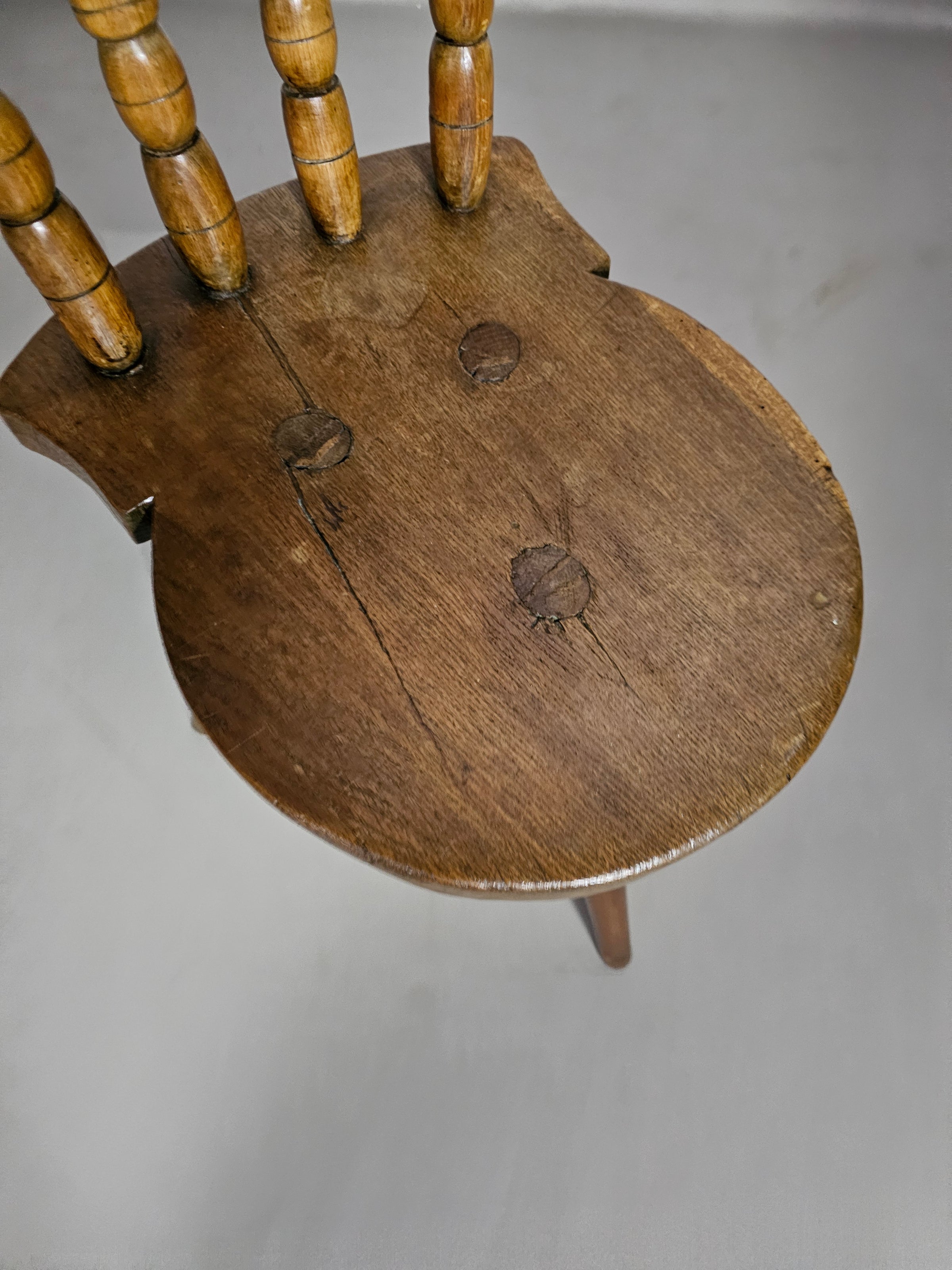 Beautiful old farmers tripod chair for decorative use.