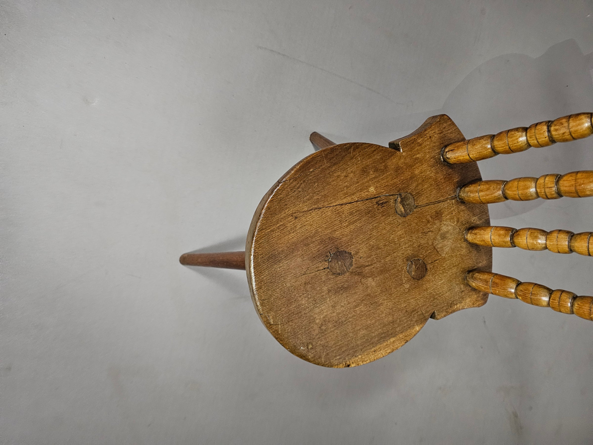 Beautiful old farmers tripod chair for decorative use.