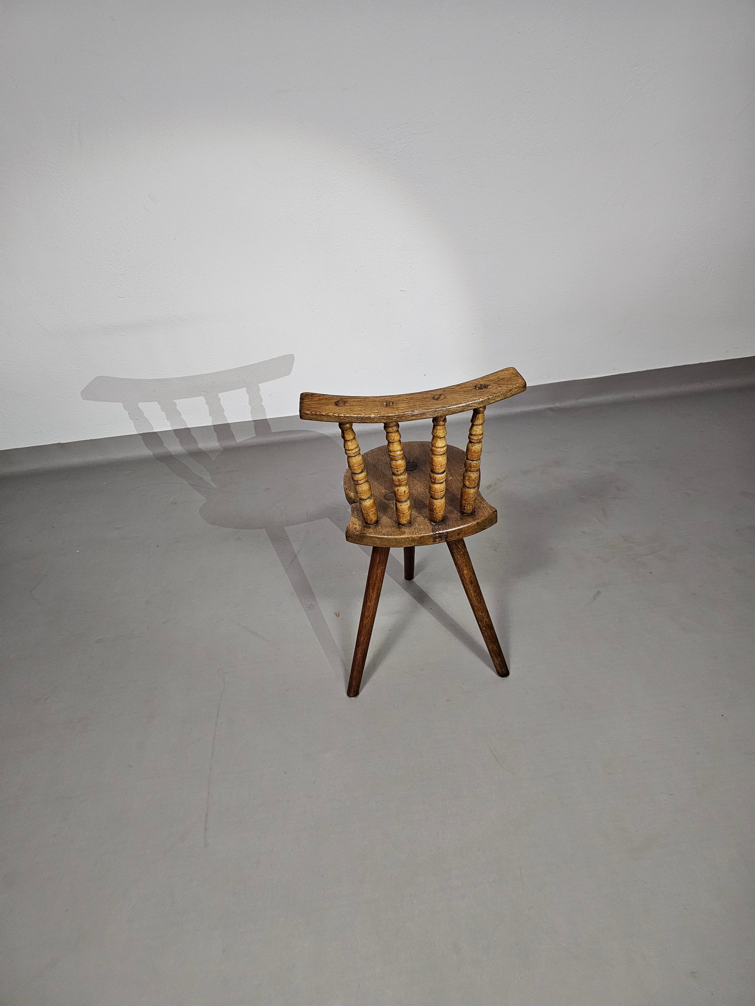 Beautiful old farmers tripod chair for decorative use.