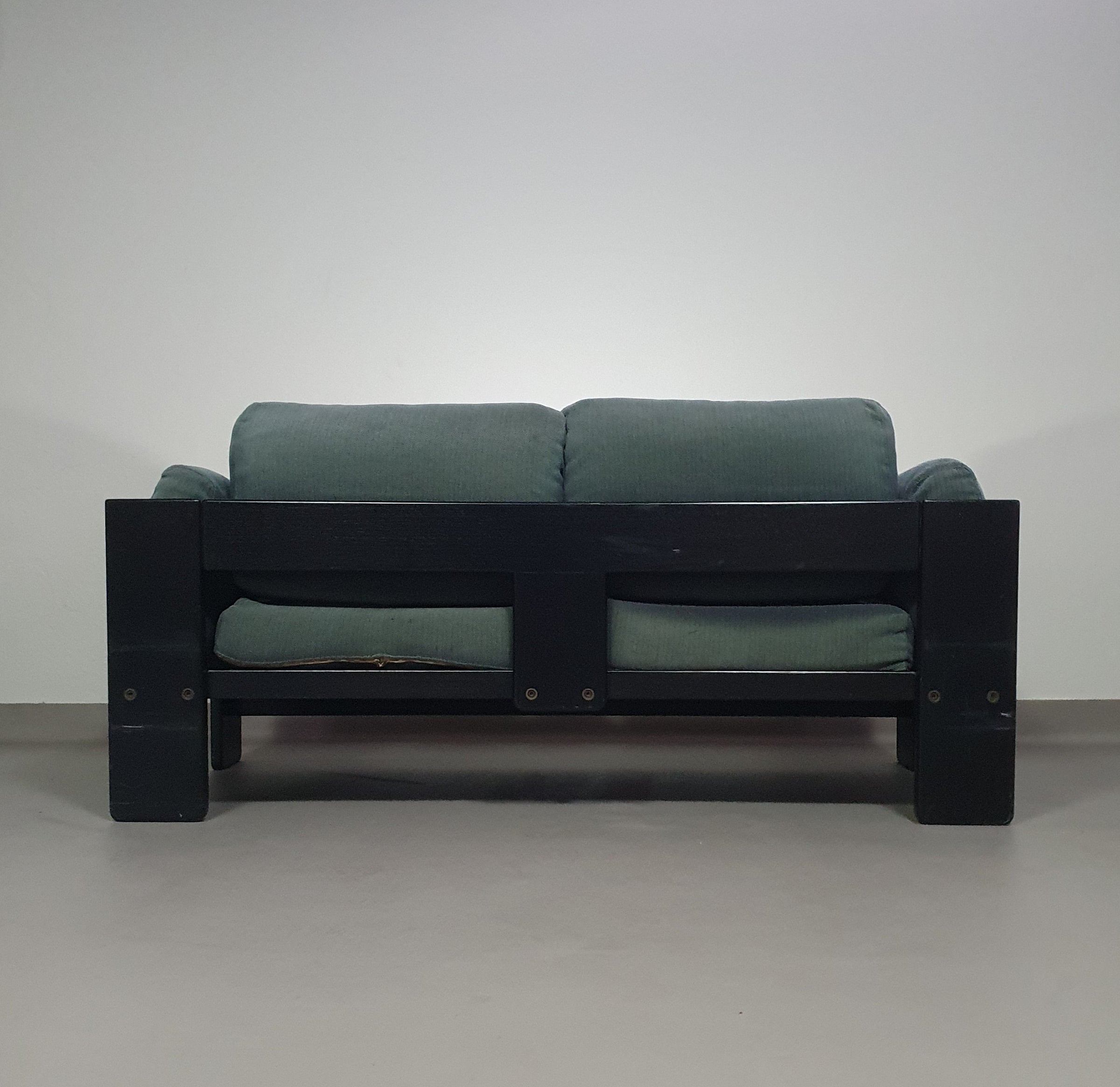 Two-seat sofa “Bastiano” from  Afra & Tobia Scarpa for Gavina, Italy 60s. Black solid wood frame and fabric cushions.