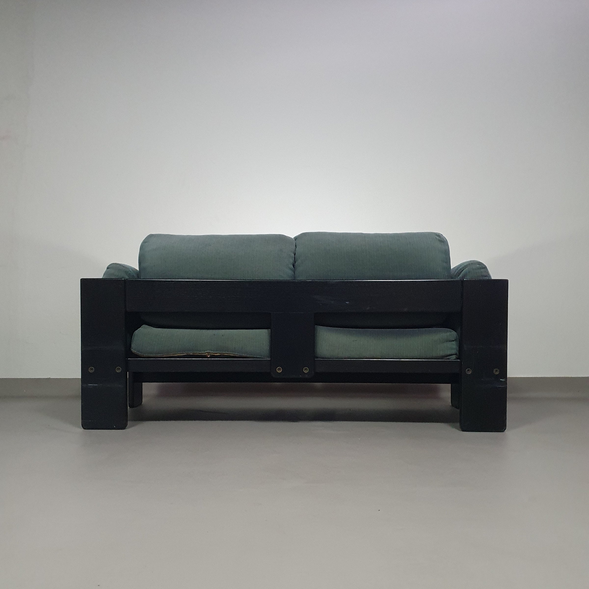 Two-seat sofa “Bastiano” from  Afra & Tobia Scarpa for Gavina, Italy 60s. Black solid wood frame and fabric cushions.