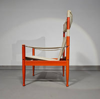 Safari lounge chair, model 30,  designed by Erik Worts and manufactured by Niels Eilersen, Denmark 1960.