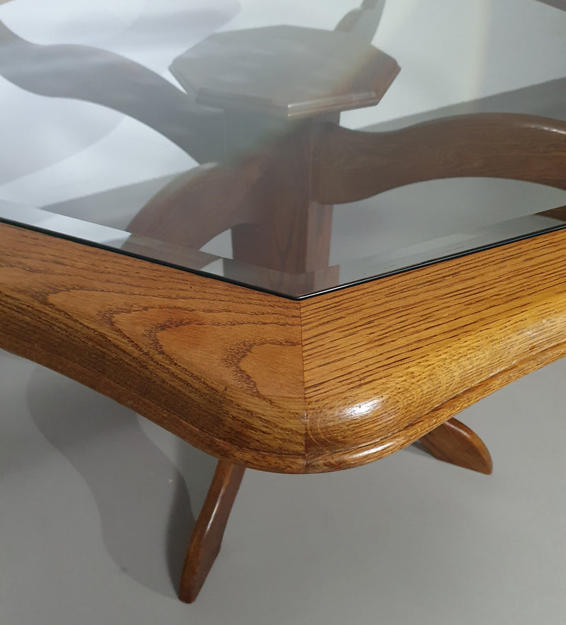 Octagonal oak dining table with inlaid glass top