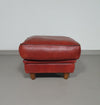 BAXTER hocker/poef in bull-leather.
Kashmir Rubis collor 1993