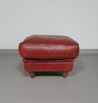 BAXTER hocker/poef in bull-leather.
Kashmir Rubis collor 1993