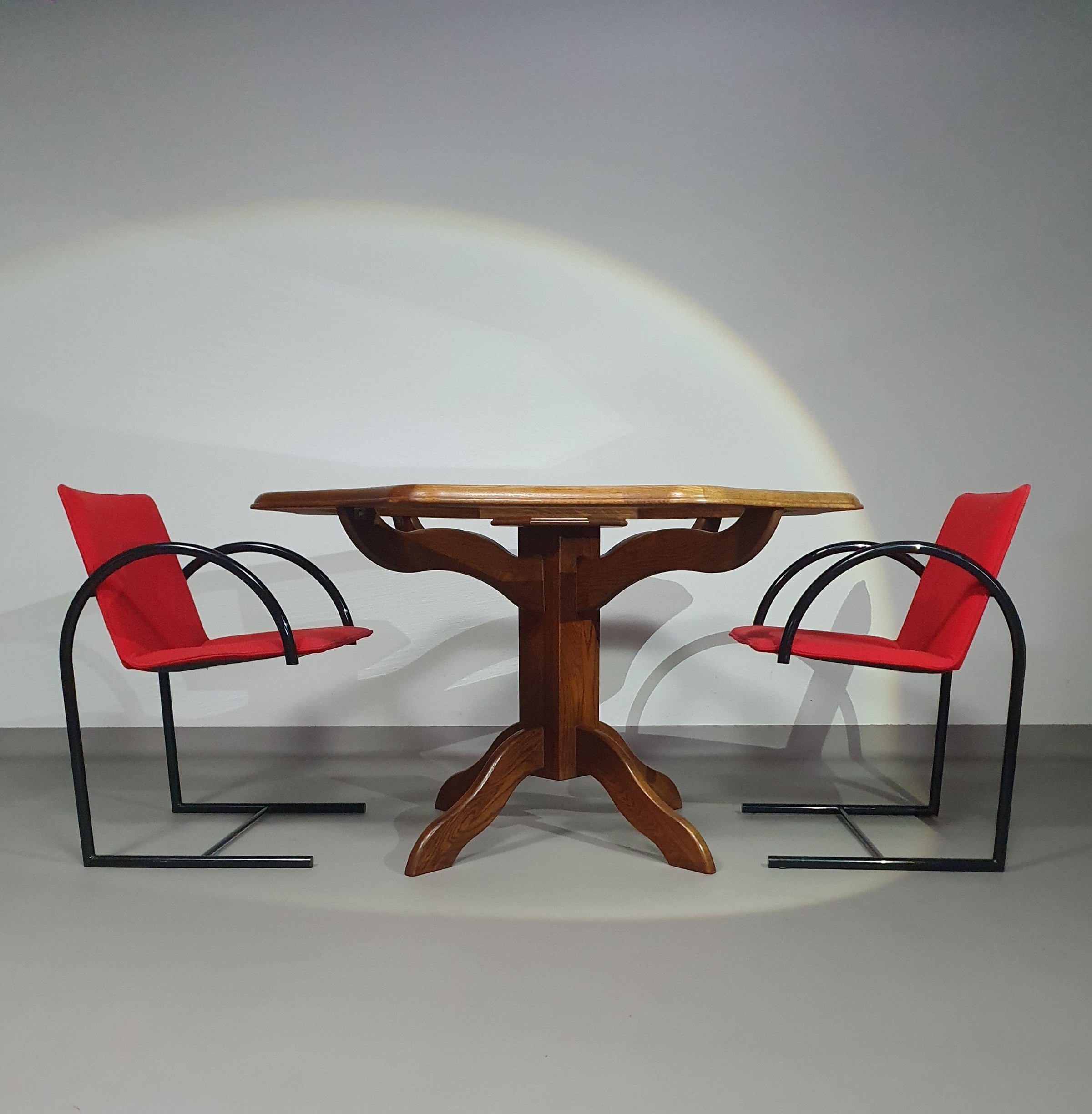 Octagonal oak dining table with inlaid glass top