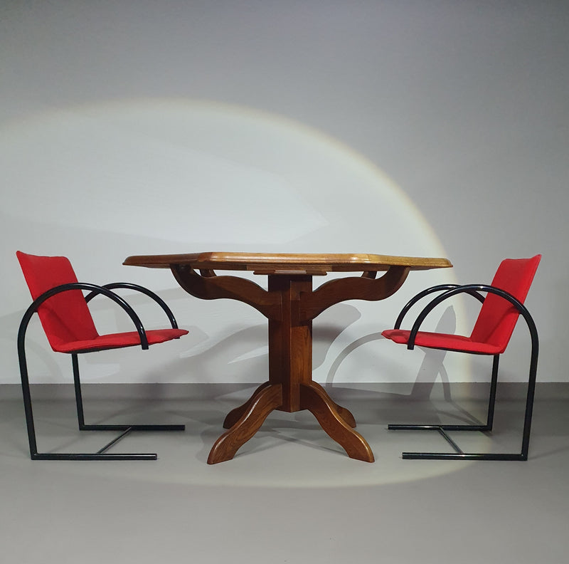 Octagonal oak dining table with inlaid glass top