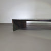 A free form large granite coffee table with three straight lines contrasting to a wavy front. 1970s