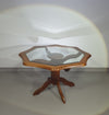 Octagonal oak dining table with inlaid glass top