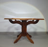 Octagonal oak dining table with inlaid glass top