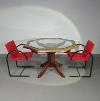 Octagonal oak dining table with inlaid glass top