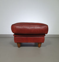 BAXTER hocker/poef in bull-leather.
Kashmir Rubis collor 1993