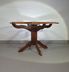 Octagonal oak dining table with inlaid glass top