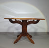 Octagonal oak dining table with inlaid glass top