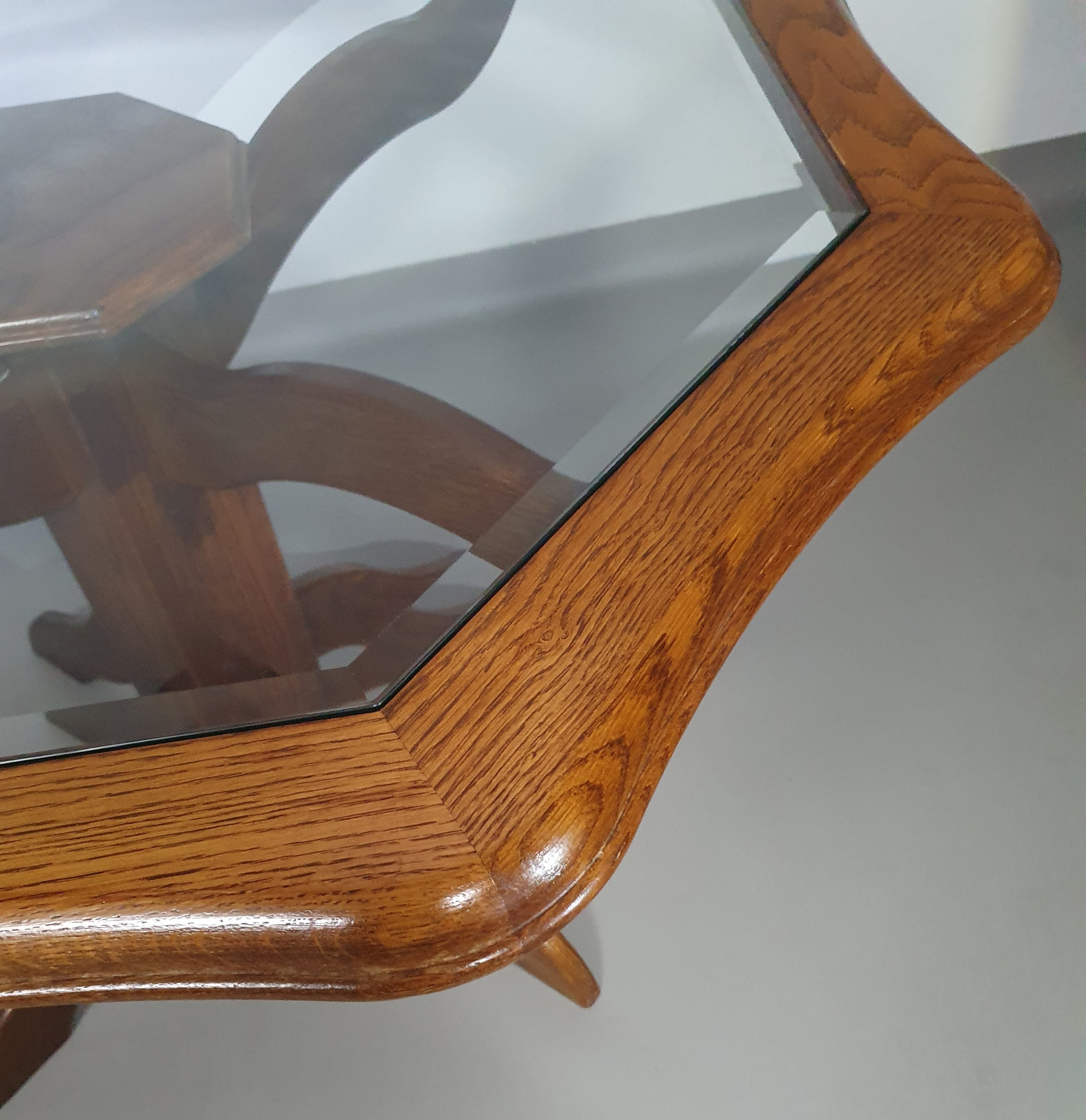 Octagonal oak dining table with inlaid glass top