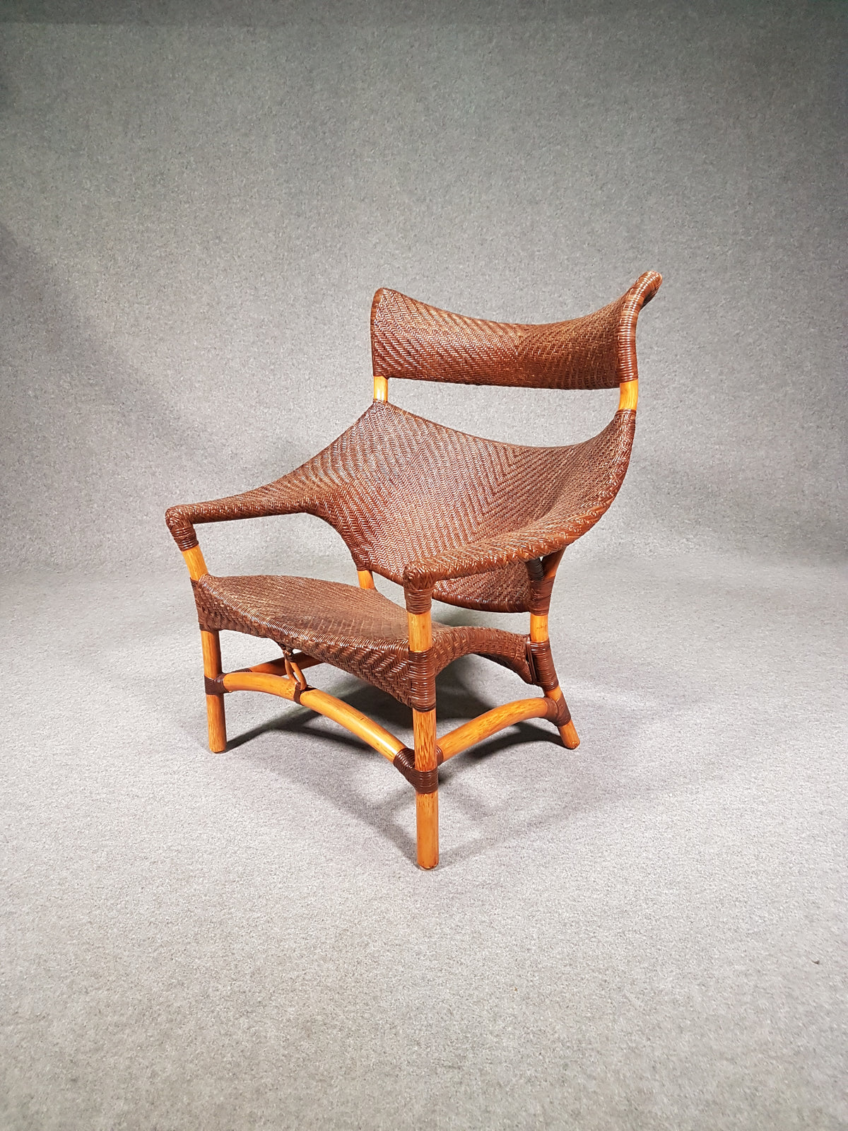 Lounge chair and footstool designed by Yuzuru Yamakawa rattan and bamboo