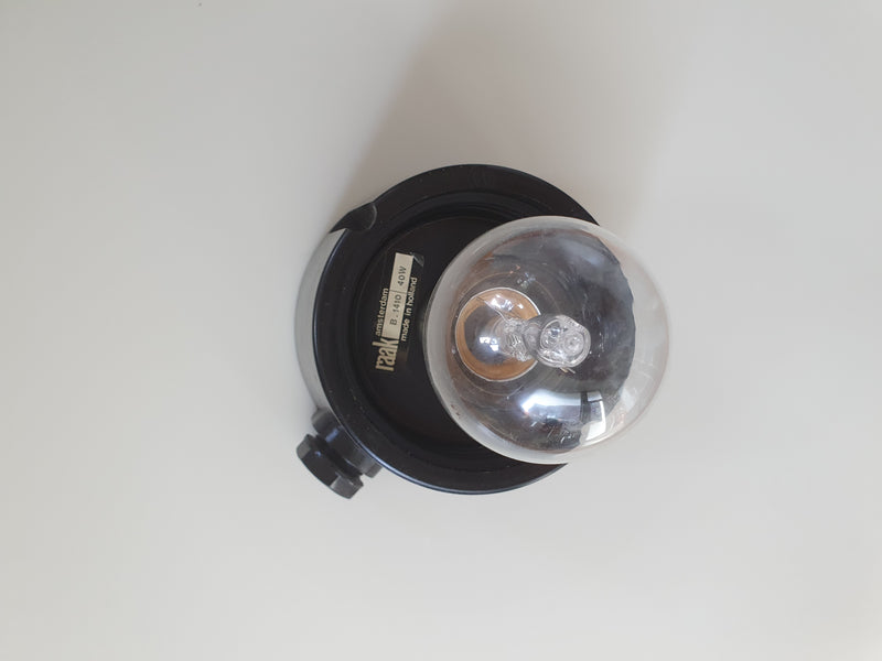 Pair of Raak Discus ceiling lamp (model B.1410) designed by Raak design team in the 60s.