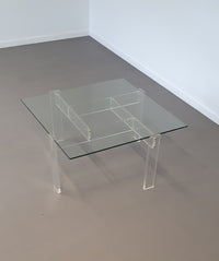 Vintage coffee table made by de Swart. Made of acrylic glass with a glass top